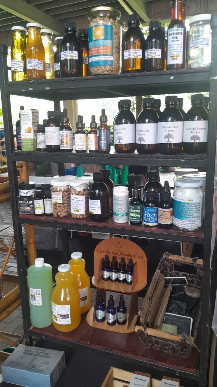 Holistic Hub shelves of cold-pressed oils, colloidal minerals, capsules and ozonated organic oils
